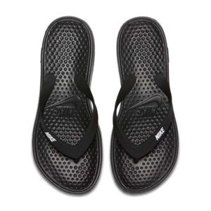 women's nike black and white flip flops